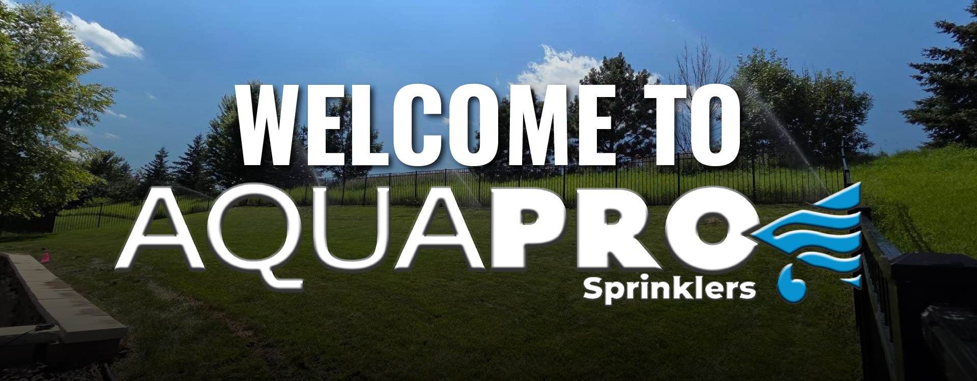 "Welcome to AquaPro" Over a dark overlay of a nice fenced it backyard, with an irrigation system professionally installed